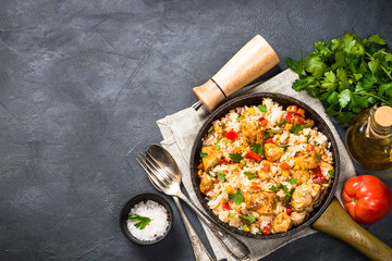 Wall Mural - Rice with chicken and vegetables top view.