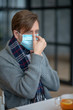 © zinkevych - Man wearing protective mask while having flu