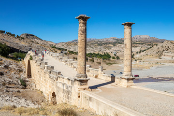 Wall Mural - The historical Severan Bridge Adiyaman, which is located on the Cendere River and is considered one of the oldest used bridges in the world. It is located in an ancient settlement area Eskikale.