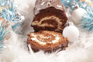 Wall Mural - christmas yule log and decoration- festive chocolate pastry with cream