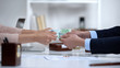 © motortion - Man and woman hands pulling euro money, dividing marital property during divorce