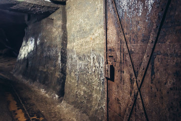 Rusty door in Cacica Salt Mine in Romania