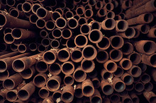 Rusty Pipes Background. End Perspective View. Industrial Concept.