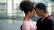 Black couple of teenagers hugging during outdoor date, love connection affection