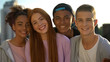 Happy multi-racial friends smiling camera, teenage unity, cheerful millennial