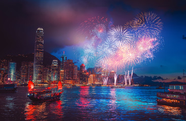 Fototapete - Firework show on Victoria Harbor  in Hong Kong 