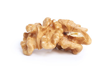 Wall Mural - Macro shot of a walnut isolated on white background