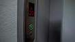 © motortion - Electronic LCD elevator display showing twenty floor down, automatic system