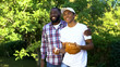 © motortion - Happy father praising son playing baseball in park, family support, connection
