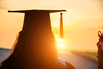 Wall Mural - Graduates wear a black hat to stand for congratulations on graduation