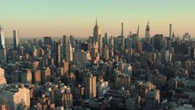 Flying Backwards Above Manhattan Buildings, New York City At Sunrise