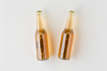 Top view of two beer bottles mockup.