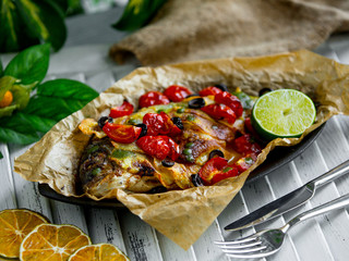 Poster - fried fish with vegetables on the table