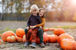 © pikselstock - Two little boys having fun in a pumpkin patch