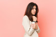 © Asier - Young brunette business woman against a pink background scared and afraid.