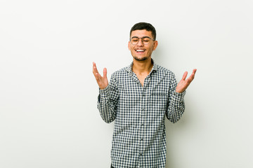 Wall Mural - Young hispanic man joyful laughing a lot. Happiness concept.