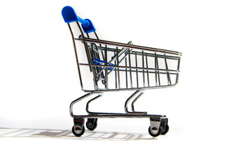 Empty shopping trolley isolated on white, closeup