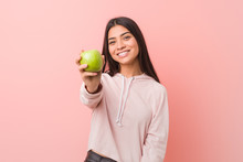 Young Arab Woman Eating An Apple