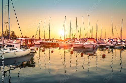 Boats docking in the marina at the Niegocin Lake during sunrise. Wilkasy, Mas...
