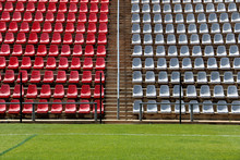 Empty Red And Grey Seating At The Rand Soccer Football Stadium, Soweto, South Africa, For Opposition, Two Competing Teams