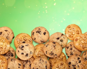 Wall Mural - Cookies with sesame seeds and chocolate on white background