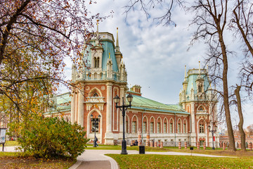 Wall Mural - Building of Grand Palace in Tsaritsyno Park against cloudy sky in autumn day. Architecture of Tsaritsyno Park in autumn