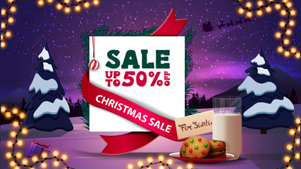 Christmas discount banner with beautiful winter landscape, paper sheet with pink ribbon and cookies with a glass of milk for Santa Claus