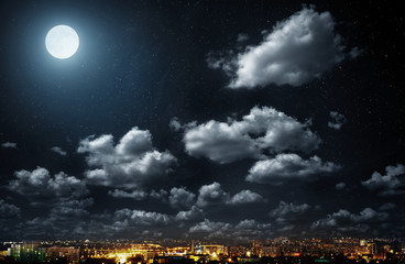 Wall Mural - city scape at night scene with full moon.