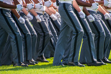 Lower Body View Of The Gray Uniform Pants Of Army Cadets As They March