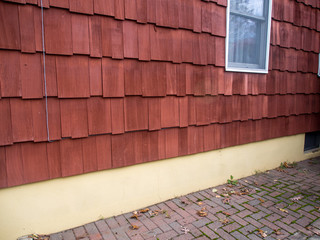 Wall Mural - ethernet cable on red house facade