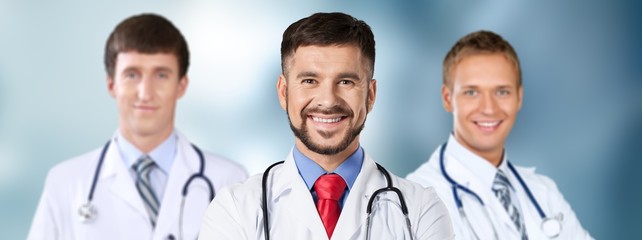 Wall Mural - Handsome doctor portrait  on background