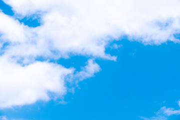 natural light from the sun with blue sky and white clouds.