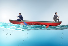 Disagreement Concept With Businessmen Rowing In Different Direct
