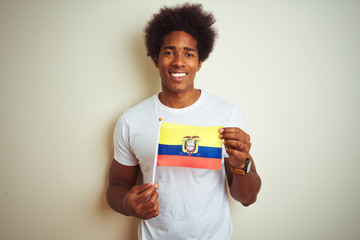 Poster - Afro american man holding Colombia Colombian flag standing over isolated white background with a happy face standing and smiling with a confident smile showing teeth