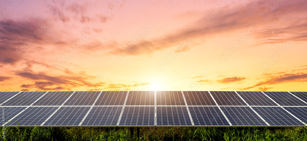 Solar panel on dramatic sunset sky background, Alternative energy concept - obrazy, fototapety, plakaty 