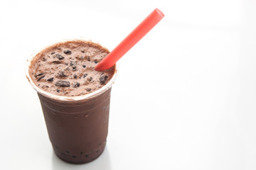 Poster - Ice chocolate with red straw put on white background