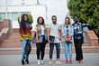 © AS Photo Family - Group of five african college students spending time together on campus at university yard. Black afro friends studying. Education theme.