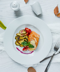 Poster - fried fish with vegetables in the plate