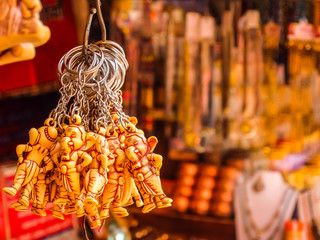 Wall Mural - Rishikesh, India. Goods in souvenir shop on the street of Rishikesh.