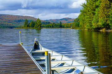 Wall Mural - Pier and boat in Monroe Lake, in Mont Tremblant National Park