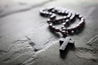 Rosary beads and crucifix cross with copy space