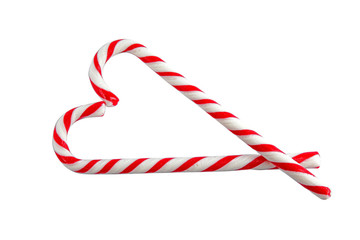 Poster - Candy canes on white background, top view. Traditional Christmas treat