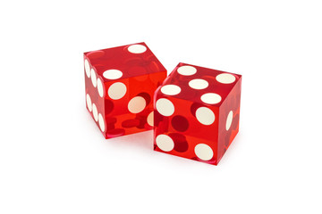 Two red professional game dice closeup isolated on a white background / two and five with a light shadow