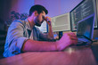 © deagreez - Profile side view portrait of his he nice attractive sad exhausted overworked guy feeling bad touching temples fail trouble shooting high tech content in dark room workplace station
