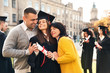 © New Africa - Happy student with parents after graduation ceremony outdoors