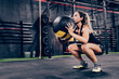 © Aparicio Febrer/ADDICTIVE STOCK - From below athletic female in sportswear training with fitball in health club