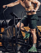 © Aparicio Febrer/ADDICTIVE STOCK - Strong man training on contemporary exercise bike in sport club