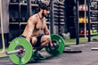 © Aparicio Febrer/ADDICTIVE STOCK - strong and athletic man doing barbell workout in modern gym