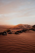 © Manuel Orts/ADDICTIVE STOCK - Cloudy sundown sky over hills and rocks in arid desert in evening in Morocco
