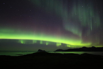 northern lights over the sea